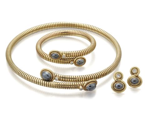 A gold, diamond and hematite parure, by Deakin &amp; Francis, comprising a collar, bangle and pair of ear clips, the collar a