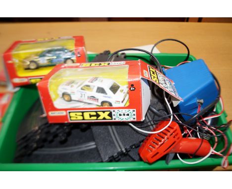 Set of scalextric to include 2 matchbox cars, transformer, track &amp; dunlop bridge