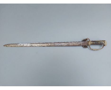 An 18thC brass-hilted hunting hanger with stylised engraving of an animal to either side of the 23.5" blade.