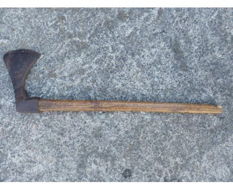 A 19thC axe - old woodworm to handle.