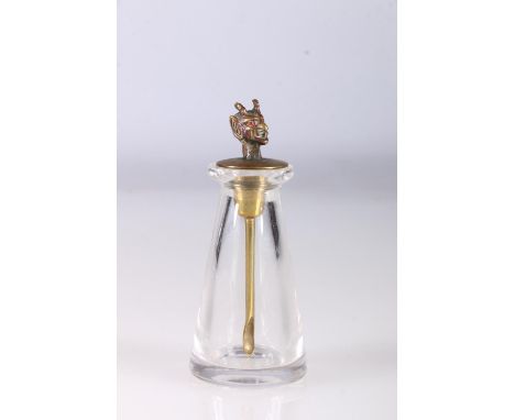 Early 20th century glass snuff bottle of conical form with spoon having devil finial with gem set eyes, 8cm. 