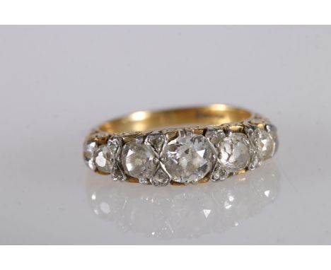 18ct yellow gold diamond thirteen-stone ring, the central 0.5ct diamond flanked by 0.25ct diamonds and 0.1ct diamonds, size J