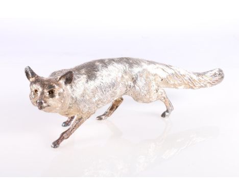 Hollow silver table model of a fox, probably by C J Vander Ltd, 32cm long, 890g gross.