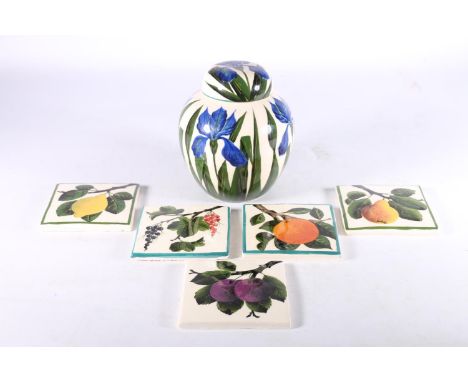Five Griselda Hill Wemyss pottery tiles of fruit design, 10cm x 10cm and a floral pattern ginger jar and cover, 16cm tall. (6