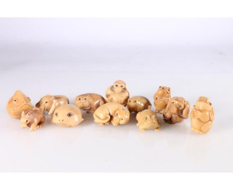 Twelve resin netsuke including fish, monkey, elephant, frog, horse etc. 