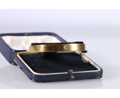 Victorian 15ct gold bangle set with 0.1ct round cut diamond, 10g, in Muir and Sons of Glasgow box.&nbsp; 