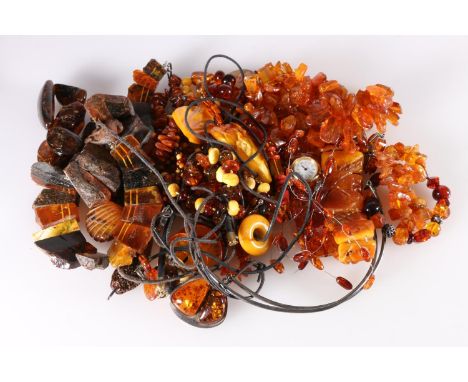 Vintage amber jewellery including necklaces, pendant, bracelets and a wristwatch.&nbsp; 