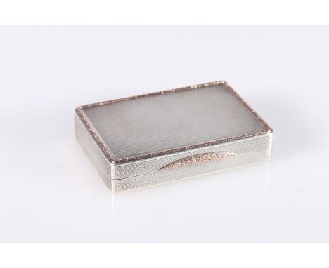 Art Deco parcel gilt silver snuff box of rectangular shape having all over engine turned decoration, the edge and thumb piece