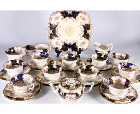 Harlequin set of Coalport English porcelain cobalt blue gilt and hand-painted floral batwing pattern 'Y2665', 'Y3086', and ot