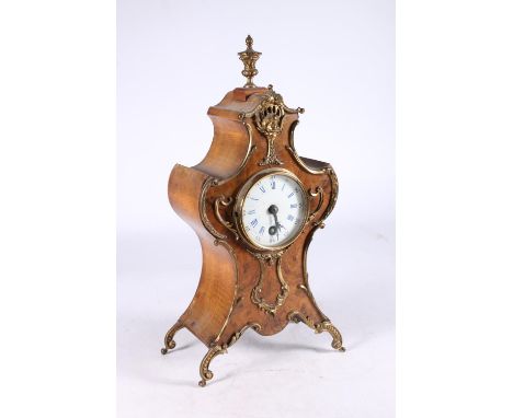 German Rococo style walnut cased mantel clock with gilt metal mounts, the enamel dial with Roman and Arabic numerals, the wor