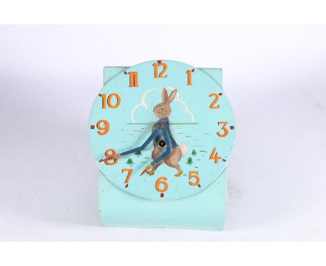 20th century wall clock painted with Peter Rabbit design, the clock hands modelled as Peter Rabbit's arms holding carrots, th