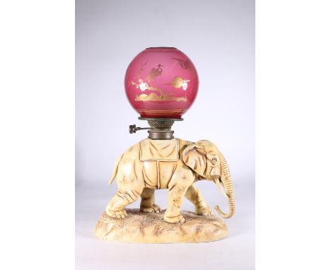 Continental porcelain oil lamp in the form of an elephant, in the manner of Alfred Stellmacher, blue mark to base '6695' and 