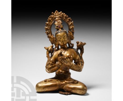 19th-early 20th century A.D.. Hollow-formed, sitting cross-legged flanked by uptala flowers, hands held in the mudra of instr