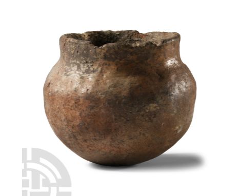 Bronze Age, 16th-14th century B.C. With rounded bottom and carinated profile, thick rim.  398 grams, 99 mm (4 in.). From a co