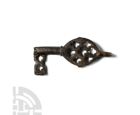 Circa 8th-10th century A.D.. Formed with a hollow bow open to the sides and with lateral struts, each plate pierced with seve