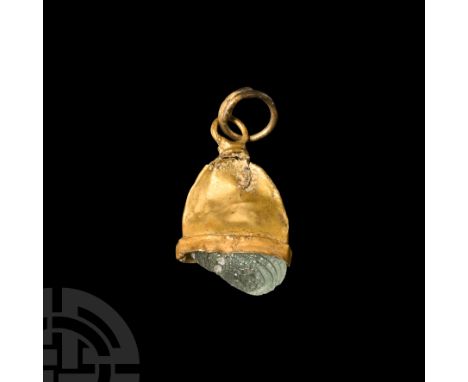 9th-11th century A.D. or earlier. Gold cup with hoop and suspension loop, aqua glass insert.  0.55 grams, 16 mm (5/8 in.). Fr