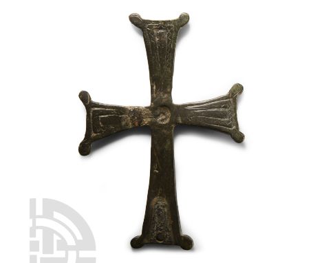 6th-7th century A.D.. Finial from a processional or altar cross, with incised guilloche bands to the obverse and central sock
