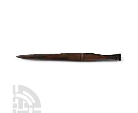 13th-12th century B.C. and later. Or a dagger with raised flanges to the grip, possibly to accept organic inserts fastened wi