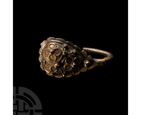 16th century A.D.. Comprising trefoil domes adorned with filigree flowers each with four petals, central jewelled setting, su