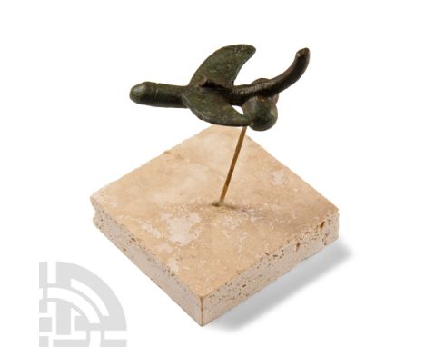 2nd-3rd century A.D.. Amuletic model phallus with swept lateral wings; mounted on a custom-made stand. Cf. Beutler, F. et al.