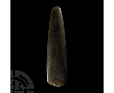 Neolithic Period, circa 6th-4th millennium B.C. With narrow conical butt and asymmetrical curved edge. Cf. MacGregor, A. (ed.