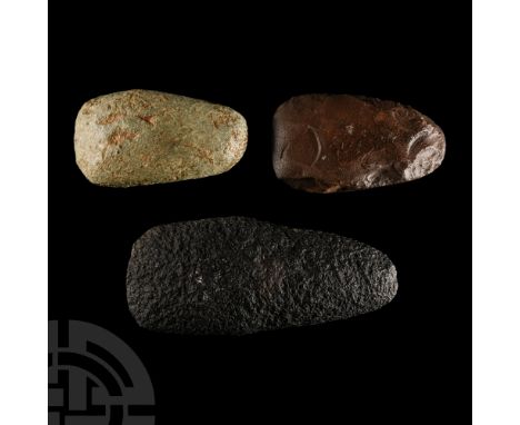 Neolithic Period, circa 6th-4th millennium B.C. Three pecked handaxes each with a rounded butt. Cf. MacGregor, A. (ed.), Anti