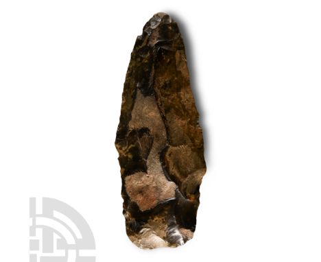 Mesolithic Period, circa 30,000-15,000 B.C. Pointed handaxe with broad, square butt and lozenge-section profile. Cf. MacGrego
