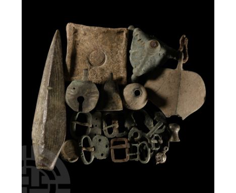 1st-19th century A.D.. Including an ivy-leaf pendant, belt buckles, crotal bell, spearhead-finial and other items  1.12 kg to