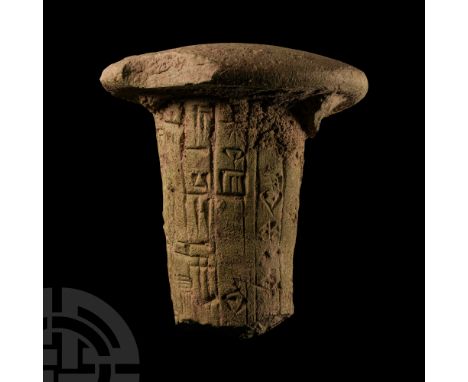 3rd-2nd millennium B.C. Conical foundation nail fragment with broad domed top, columns of cuneiform text to the shank:'dnin-g