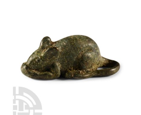 2nd-3rd century A.D.. Shown with semi-naturalistic detailing in a crouching posture, eating a nut held in its front paws. Cf.