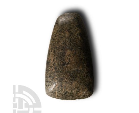 Neolithic Period, 6th-4th millennium B.C. Beautifully shaped and polished axe with gently curved cutting edge, tapering butt.
