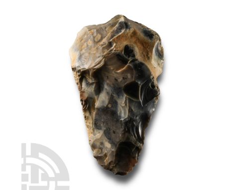 Lower Palaeolithic Period, circa 480,000-250,000 B.P.. With one convex and one straight side, rounded butt, broad tip. Cf. Ma