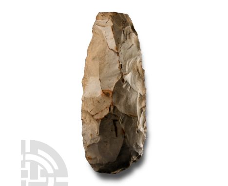 Neolithic Period, circa 4th-3rd millennium B.C. Biconvex in section with broad cutting edge, tip of butt absent. Cf. MacGrego