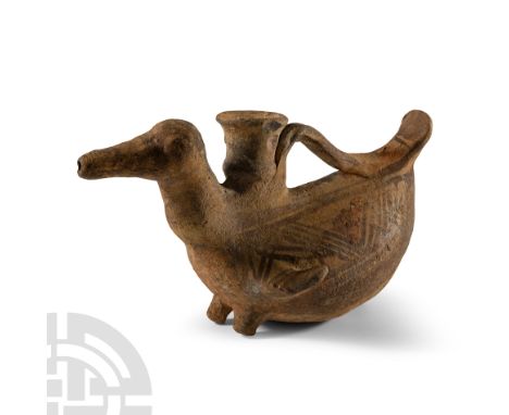 Late Bronze Age, 1100-1000 B.C. Hollow-formed as a bird, possibly a duck, with its beak acting as a spout, small lateral flan