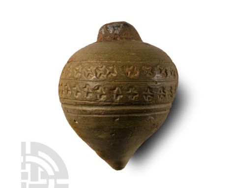10th-13th century A.D.. Compressed spherical body, the upper part with impressed decoration consisting of two rows of Saint A