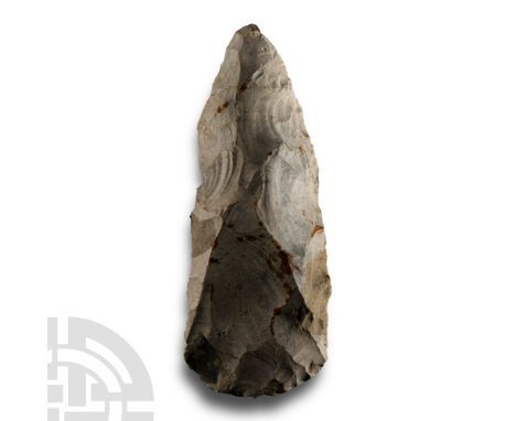 Neolithic Period, circa 4th-3rd millennium B.C. Narrow body with broad butt; old collector's label to one side 'Hache Taillée