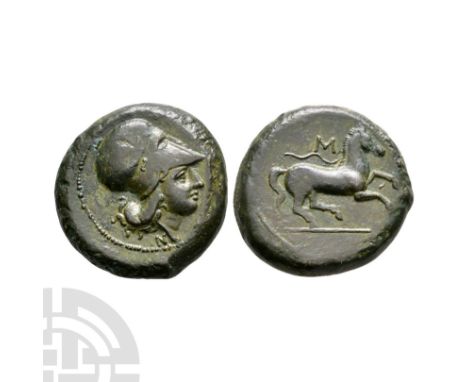 405-401 B.C. Obv: [AITNAIW]N around head of Athena right, wearing Corinthian helmet. Rev: horse galloping right, rein trailin