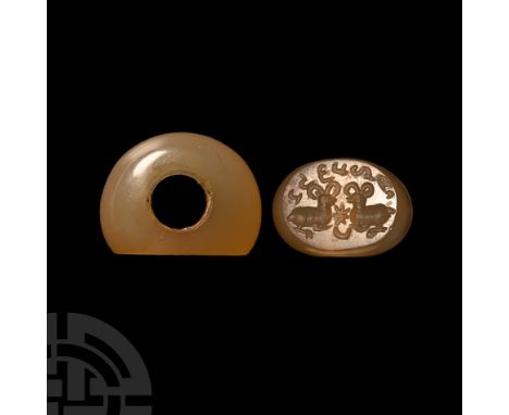 3rd-7th century A.D.. With intaglio scene of two opposed rams with a star between and legend above. Cf. Gyselen, R., Acta Ira