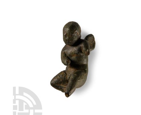 Circa 1st-2nd century A.D.. Modelled in the round with one leg extended, head turned, two small dorsal wings. Cf. Durham, E.,