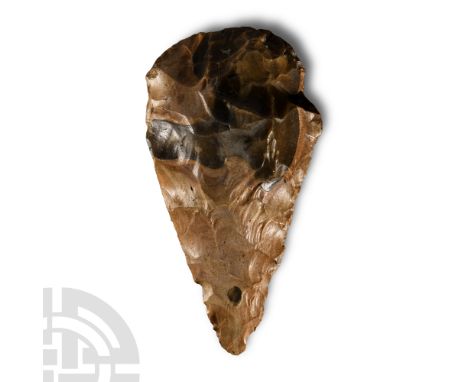 Palaeolithic Period, circa 200,000 B.C. Triangular with broad rounded butt; with old inked inscription: 'Colchester Valley'. 