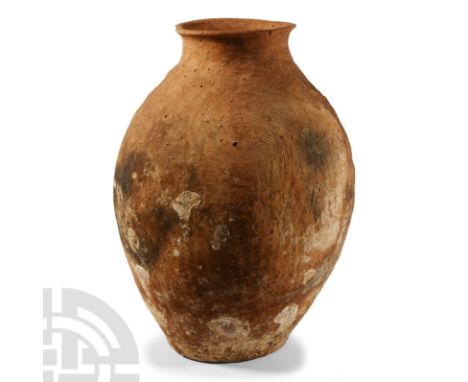 Early Bronze Age, 3rd millennium B.C. With slender biconvex body, broad neck, rolled rim and flat base.  5.2 kg, 38.3 cm high