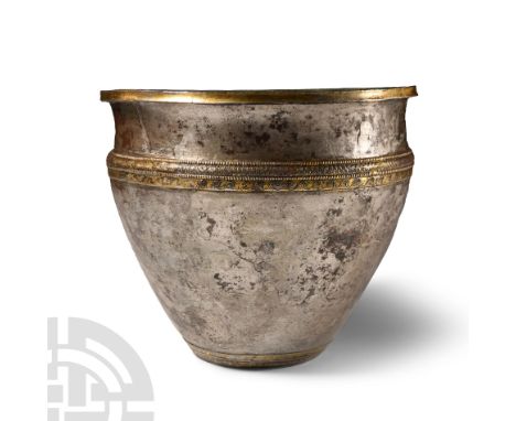 2nd-1st century B.C. Broad vase or jar with everted rim, carinated shoulder, gilt bands to the foot, shoulder and rim; some r
