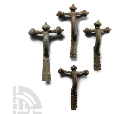 3rd-4th century A.D.. Each with onion-shaped knops to the head, deep bow and footplate with decorative detailing.  147 grams 