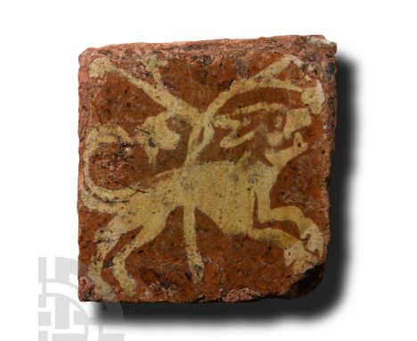 France, Burgundy, circa 1370-1400 A.D.. Square tile with cream-coloured image of a hound running past a tree. Cf. Norton, E.C