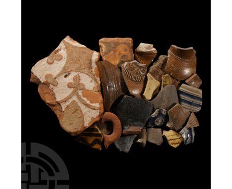 14th-17th century A.D.. Including glazed heraldic floor tile, ribbed jug with horizontal banding, bellarmine jug pieces with 