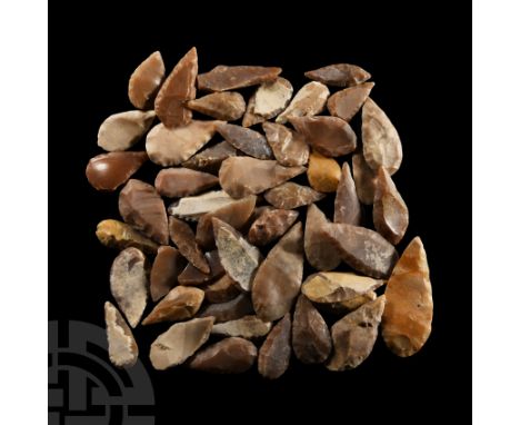 Neolithic Period, circa 8th-5th millennium B.C. Comprising mostly bifacial and uniface leaf-shaped flint and chert arrowhead;