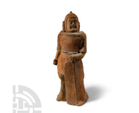 Northern Wei Dynasty, 386-534 A.D. or later. Hollow-formed, modelled in the round, warrior wearing lamellar armour to chest, 
