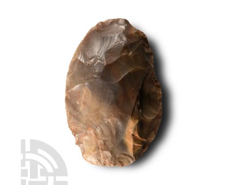 Neolithic Period, 6th-4th millennium B.C. Substantial cordiform handaxe with remains of the cortex.  203 grams, 97 mm (3 3/4 