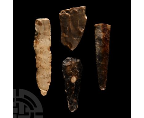 Mesolithic to Neolithic Period, circa 8th-2nd millennium B.C. Group of gouges and handaxes including a 'livre de beurre' core