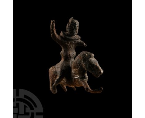 Circa 1st-2nd century A.D.. Two-part model comprising: galloping horse with fore-legs extended, detailed mane; rider wearing 